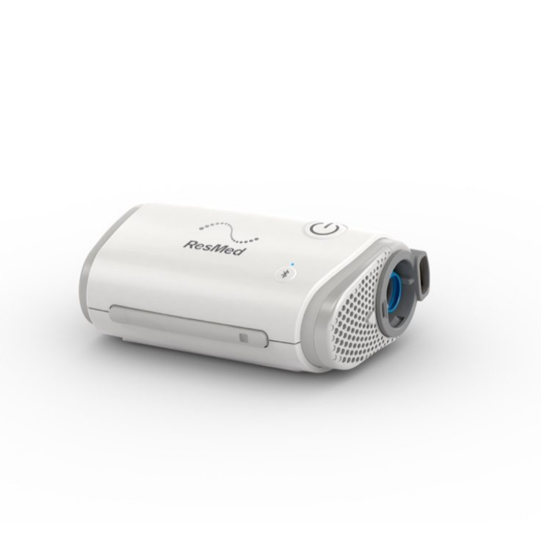 Travel CPAP ResMed AirMini in hand
